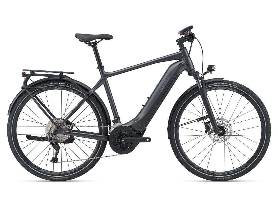 Explore e+ 1 gts bike in black color, with a brand sticker named giant on the frame and back seat - electric bikes.