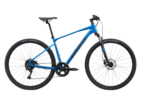 A giant roam 4 disc 28 bicycle, colored blue, with a sticker displaying the brand name 'giant' on the frame.